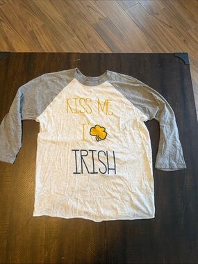 Women’s 3/4 length sleeve tee. Gray sleeves, gray and white body.